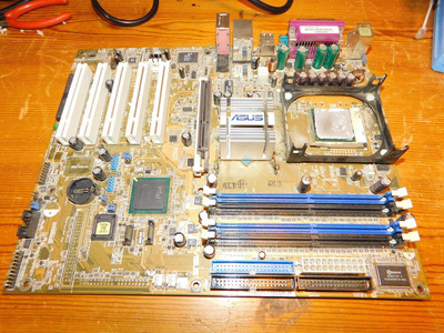 Asus P4P800 with a bad cap.jpg