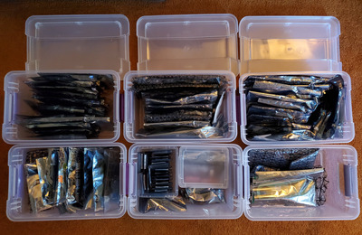 Hardware sorted in bins.jpg