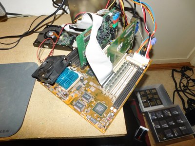PC Chips M560 + Cyrix 6x86MX 200 + 32MB + P233 MMX and 486 CPU lot.JPG